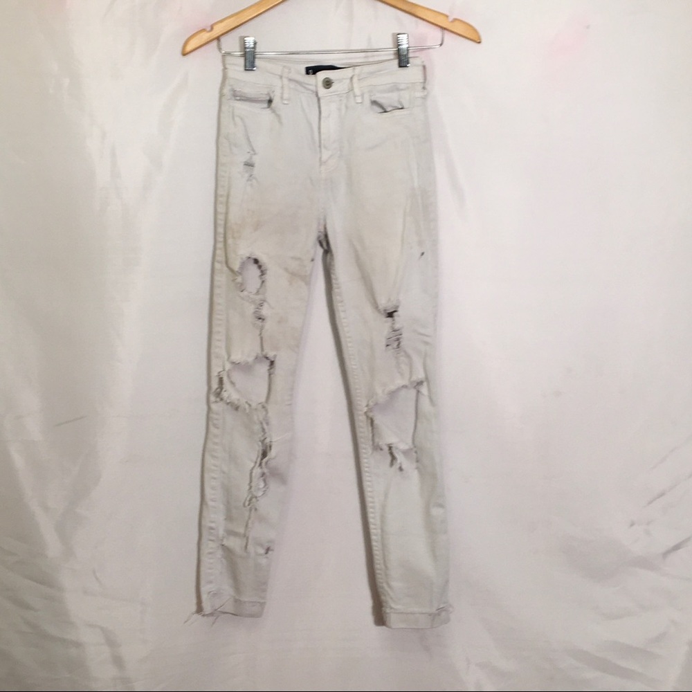 Destroyed white jeans